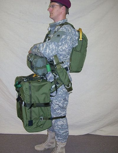 Left side view of man posing with Invasion II with Rapid Release Harness
