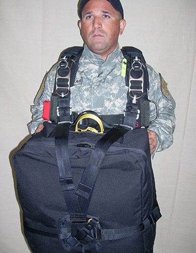 Man posing with Light Load Tactical in high front position